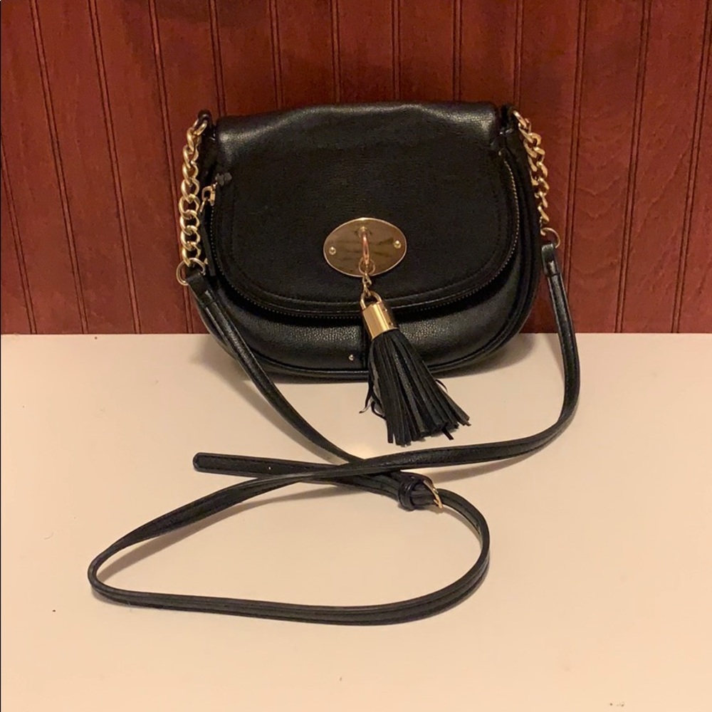 Black cross body with tassel and gold accents